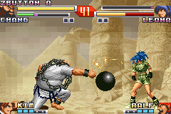 The King of Fighters EX2: Howling Blood (Game Boy Advance) screenshot: Chang's Ball and Bash move meets Leona's Earring Bomb: a quick advantage for her explosive attack...