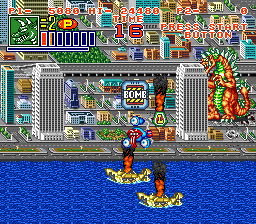 King of the Monsters 2: The Next Thing (SNES) screenshot: The bomb icons can do damage if they get touched
