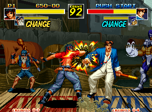 Kizuna Encounter: Super Tag Battle (Neo Geo) screenshot: Rosa attempts to hit-damage Kim through a simple elbow attack... And luckily, her offensive worked!
