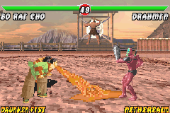 Mortal Kombat: Tournament Edition (Game Boy Advance) screenshot: Trying to crush Drahmin's guard, Bo' Rai Cho attacks using his spitting-based move Puke Puddle.