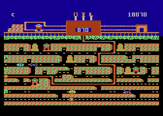 Oil's Well (Atari 8-bit) screenshot: Winding your way through the passages to collect oil
