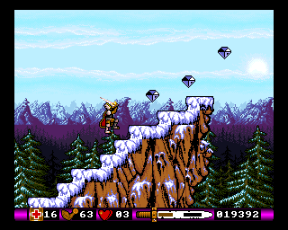 Pegasus (Amiga) screenshot: Collecting diamonds on the top of a mountain. They can be used to buy upgrades.