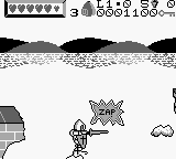 Wizards & Warriors X: Fortress of Fear (Game Boy) screenshot: Killing an enemy from a moving platform