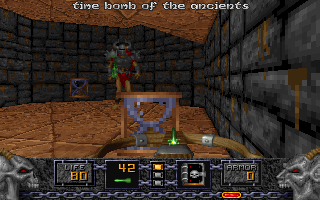 Heretic (DOS) screenshot: The Time Bomb of the Ancients is one of items unique to <i>Heretic</i>. Drop one in the path of advancing monsters and watch the fireworks.