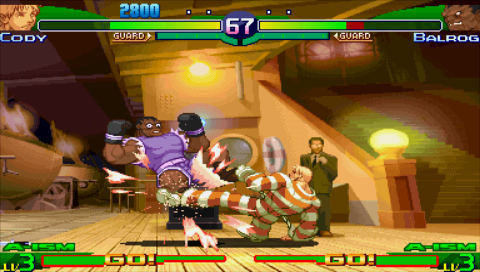 Street Fighter Alpha 3 Max (PSP) screenshot: Cody vs Balrog -- check Balrog's eyes