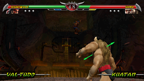 Mortal Kombat: Unchained (PSP) screenshot: Goro holding on to Nightwolf's arrow, and Nightwolf taking a big leap toward him