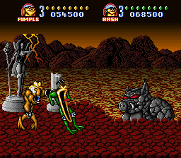 Battletoads in Battlemaniacs (SNES) screenshot: The rock pig boss monster approaches and the Toads are suitably scared