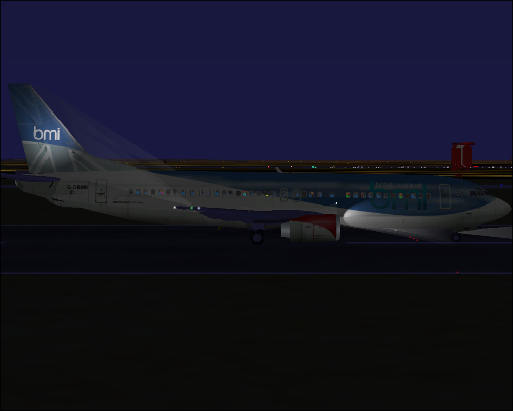 737-400: Greatest Airliners - Special Edition (Windows) screenshot: British Midlands version at night, at Heathrow airport.