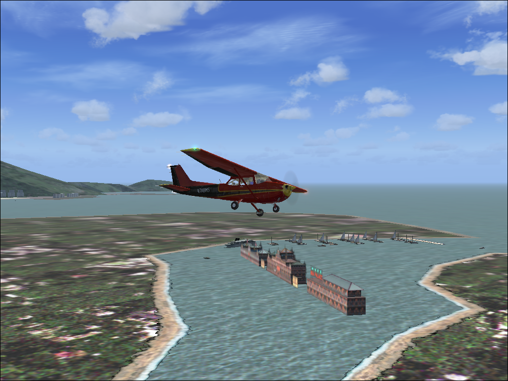 Hong Kong for Microsoft Flight Simulator 2004 (Windows) screenshot: The floating restaurants are modeled, with junk farms close by.