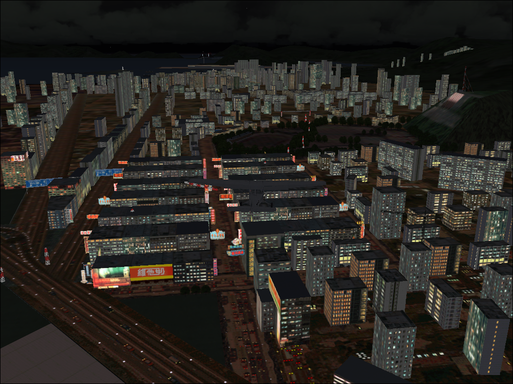 Hong Kong for Microsoft Flight Simulator 2004 (Windows) screenshot: A night view; checkerboard hill is to the right in the picture.