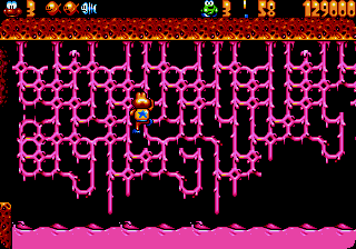 James Pond 3 (Genesis) screenshot: Climbing some net structure made of candy.