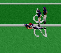 NFL Football (SNES) screenshot: The camera zooms in on a tackled player