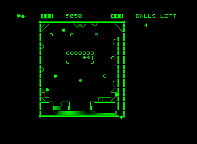 Pinball (Commodore PET/CBM) screenshot: Bumpers change colour when hit. I collected a spade and heart.