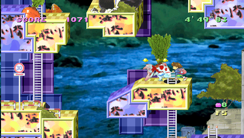 Umihara Kawase: Shun - Second Edition (PSP) screenshot: Reeling in a stunned fish.