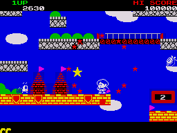 Rainbow Islands (ZX Spectrum) screenshot: Jumping into these stars makes them explode and shoot in all directions killing any enemies in its path