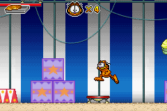 Garfield and his Nine Lives (Game Boy Advance) screenshot: Jumping on a trampoline