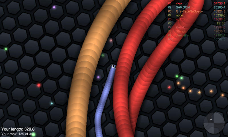 slither.io (Android) screenshot: Between two top snakes