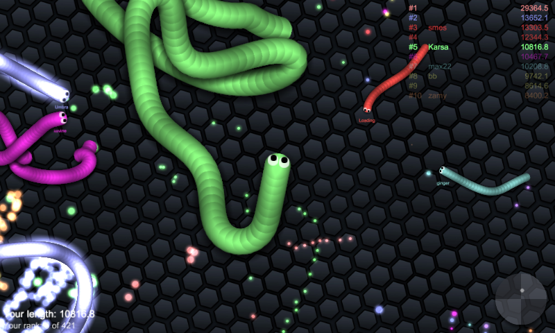 slither.io (Android) screenshot: Everyone is trying to grab something off the table