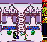 The Grinch (Game Boy Color) screenshot: Grinch attacks.