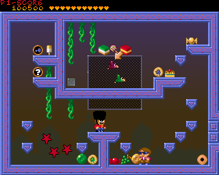 Naughty Ones (Amiga) screenshot: This level introduces switches that make additional blocks appear, allowing you to reach inaccessible items like the key on the top left.