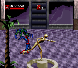 Venom • Spider-Man: Separation Anxiety (SNES) screenshot: Even the statue is indicative of what to do in this situation.