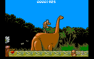 Chuck Rock (Amiga CD32) screenshot: Riding a dinosaur across the swamp.