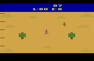 Revenge of the Apes (Atari 2600) screenshot: In the desert. Beware oftouching the orangutan.