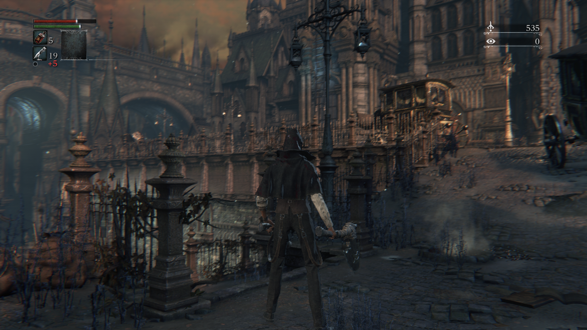 Bloodborne (PlayStation 4) screenshot: Back to Yharnam with some actual gear this time. We've just stepped out of the Clinic.