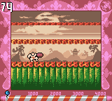 Rugrats in Paris: The Movie (Game Boy Color) screenshot: Trying to bean the Sumo