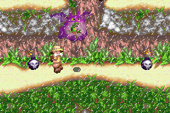 Sabre Wulf (Game Boy Advance) screenshot: Send bad guys flying away.