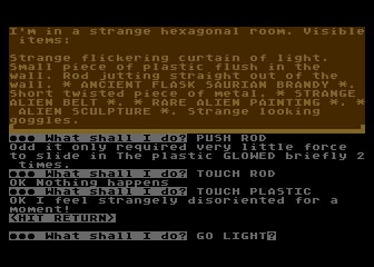 Scott Adams' Graphic Adventure #6: Strange Odyssey (Atari 8-bit) screenshot: I'm acquiring lots of strange items in this hexagonal room.
