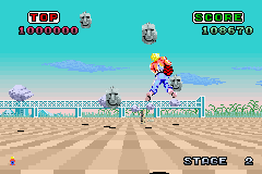 SEGA Arcade Gallery (Game Boy Advance) screenshot: Space Harrier: the flying stone heads move quite quickly.