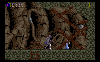 Shadow of the Beast (Amiga) screenshot: You have only one single life in this difficult game. Fortunately, you can replenish your health with magic potions.