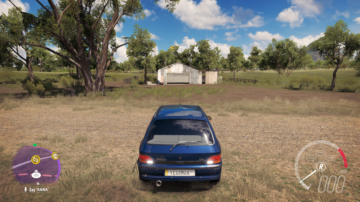 Forza Horizon 3 (Xbox One) screenshot: Let's see what car is hidden inside that barn.