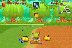 Shrek: Swamp Kart Speedway (Game Boy Advance) screenshot: There are different powerups you can get in the races such as having pumpkins spinning around you
