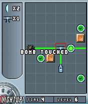 Absolute Puzzle (J2ME) screenshot: Lights Up's level 6 introduces bombs.