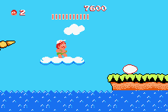 Adventure Island (Game Boy Advance) screenshot: These clouds can hold your weight but the odd one will fall when trod upon