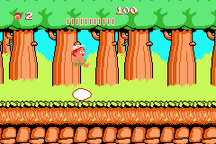 Adventure Island (Game Boy Advance) screenshot: These eggs contain helpful weapons and items