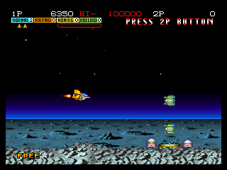 Andro Dunos (Neo Geo) screenshot: Enemies launching from a ground installation