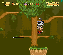 Astérix (SNES) screenshot: Beating the Romans in the forest.