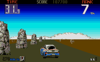 Big Run (Atari ST) screenshot: Rocks split the road OutRun-style here
