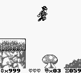 The Blues Brothers: Jukebox Adventure (Game Boy) screenshot: Bouncing on the mushrooms allows you to jump really high in the air