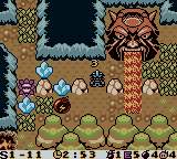 Bomberman Max: Red Challenger (Game Boy Color) screenshot: Setting a bomb to destroy the crystal and open up a path