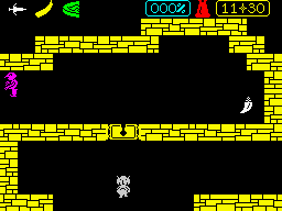 Riddler's Den (ZX Spectrum) screenshot: <i>If a gold door bars your way<br> You need not hang around all day<br> Take a key from the right pocket<br> Should you wish to unlock it<br></i>