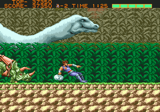 Strider (Genesis) screenshot: Casually stroll past a dinosaur.