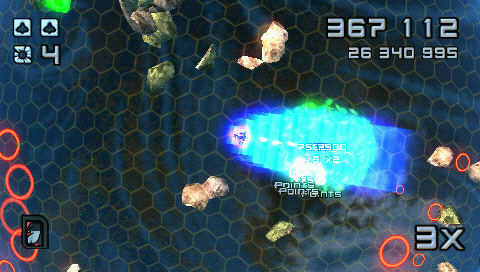 Super Stardust Portable (PSP) screenshot: The ship can use a boost to get out of smelly situations fast