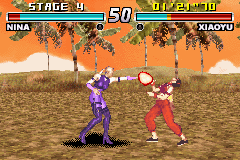 Tekken Advance (Game Boy Advance) screenshot: Nina delivering a series of punches to Xiaoyu.