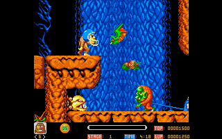 Toki (Amiga) screenshot: Wearing a helmet for protection.