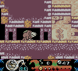 Toonsylvania (Game Boy Color) screenshot: Crawling through a passageway.