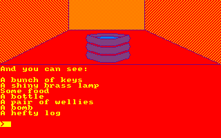The Very Big Cave Adventure (Amstrad CPC) screenshot: Inside the brick building, home to loads of stuff
